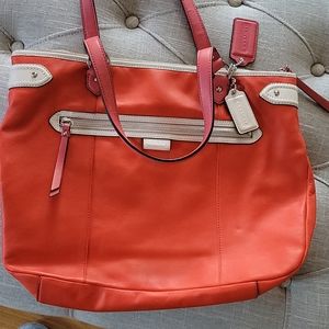 Orange leather Coach bag.